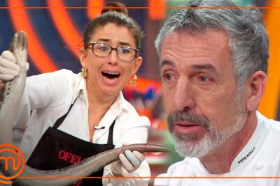 Mujer con gafas sorprendid­a sostiene una anguila mientras un chef serio observa 0j SJrCxjaI