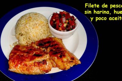 Plato con filete de pescado a la plancha, arroz y salsa fresca eeXPWejPCZo
