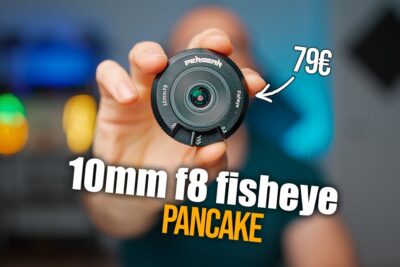 Mano sosteniendo una lente pancake 10mm f8 ojo de pez con fondo desenfocado i5tbn56XitA