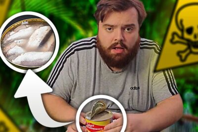Hombre con barba abre una lata de pescado fermentado con expresión de sorpresa w4GI0YWU1Q 7